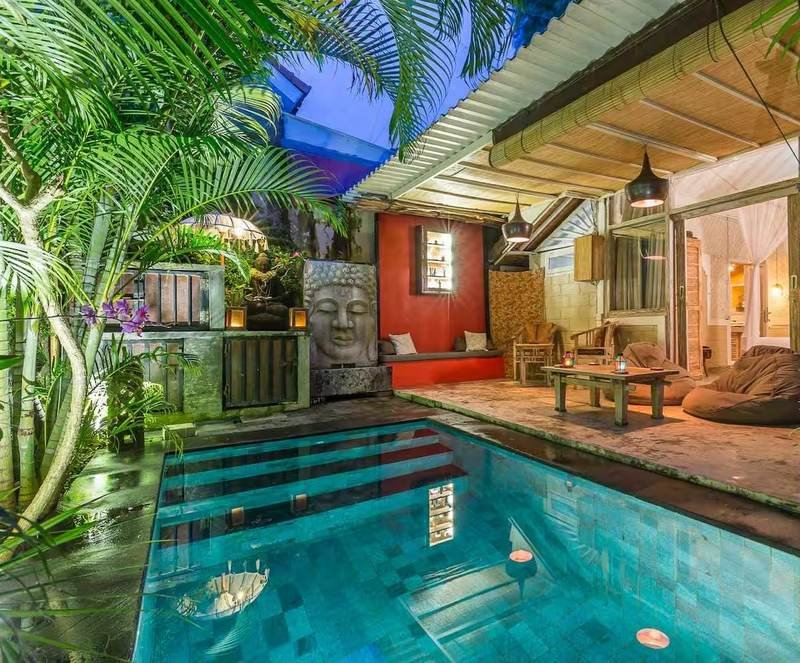 Villa Dua De Is Seminyak, Bali — pool, outdoor terrace and red villa wall
