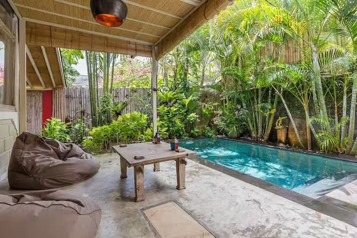 Villa Dua De Is Seminyak, Bali — terrace seating by greenery