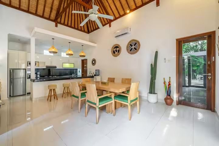 Villa Nemia Seminyak, Bali — dining table and kitchen