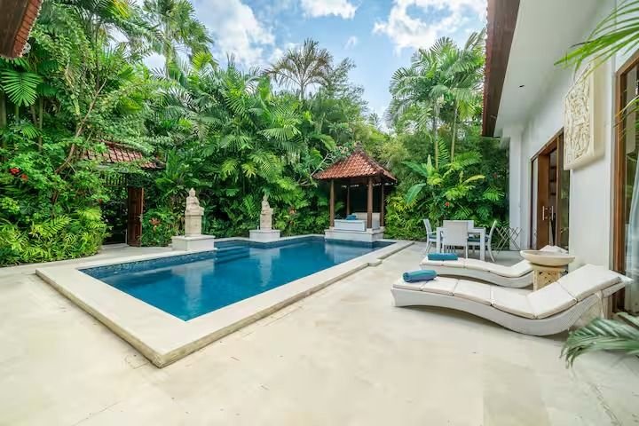 Villa Nemia Seminyak, Bali — pool and loungers