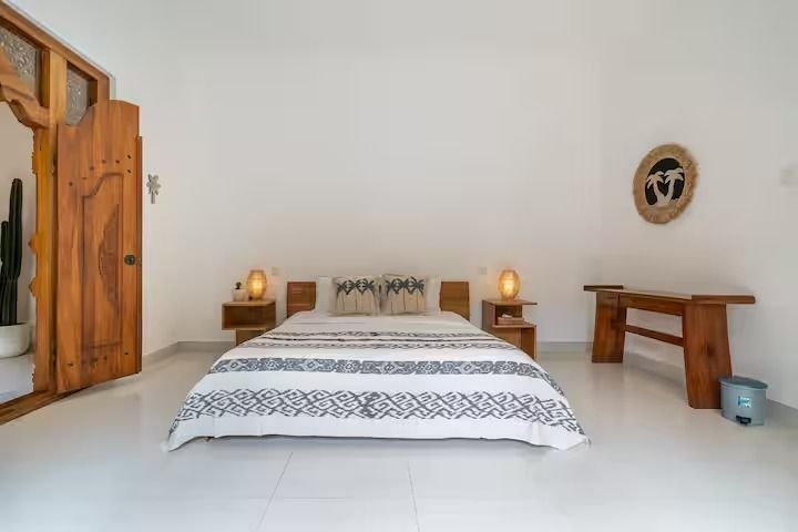 Villa Nemia Seminyak, Bali — bedroom and bedside tables