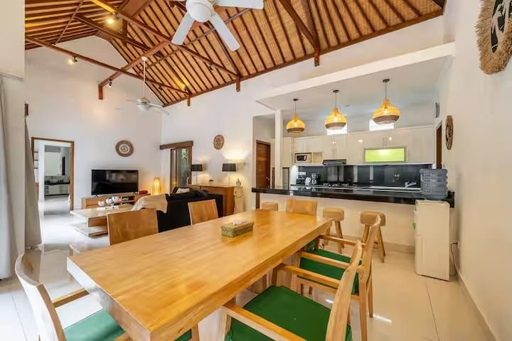 Villa Nemia Seminyak, Bali — dining table and kitchen