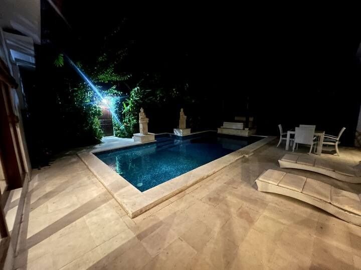 Villa Nemia Seminyak, Bali — pool illuminated at night