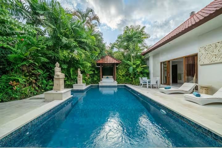Villa Nemia Seminyak, Bali — swimming pool and garden