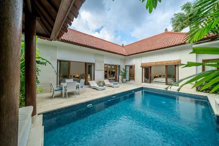 Villa Nemia Seminyak, Bali — pool and shaded lounge