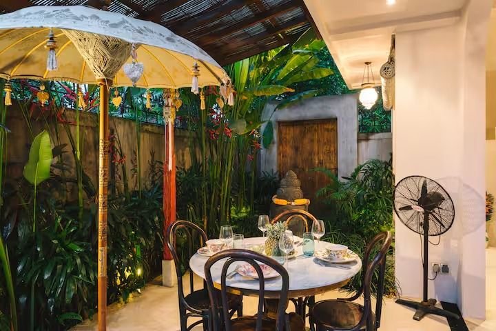 Villa Vickary Seminyak, Bali — outdoor garden dining table